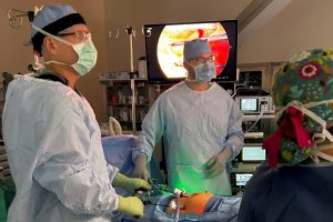 Surgeons performing surgery.